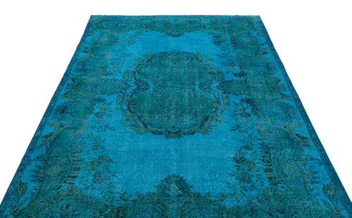 Load image 1 in gallery view. Bright turquoise and dark teal distressed rug with a traditional central medallion and ornate floral border.