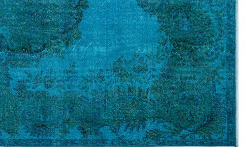 Load image 1 in gallery view. Teal and dark blue rug with a distressed, traditional floral medallion pattern.