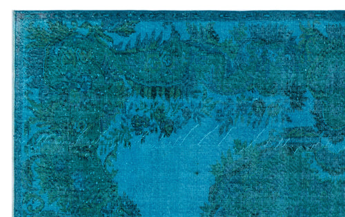Load image 1 in gallery view. Teal and dark blue distressed rug with a traditional floral medallion pattern.