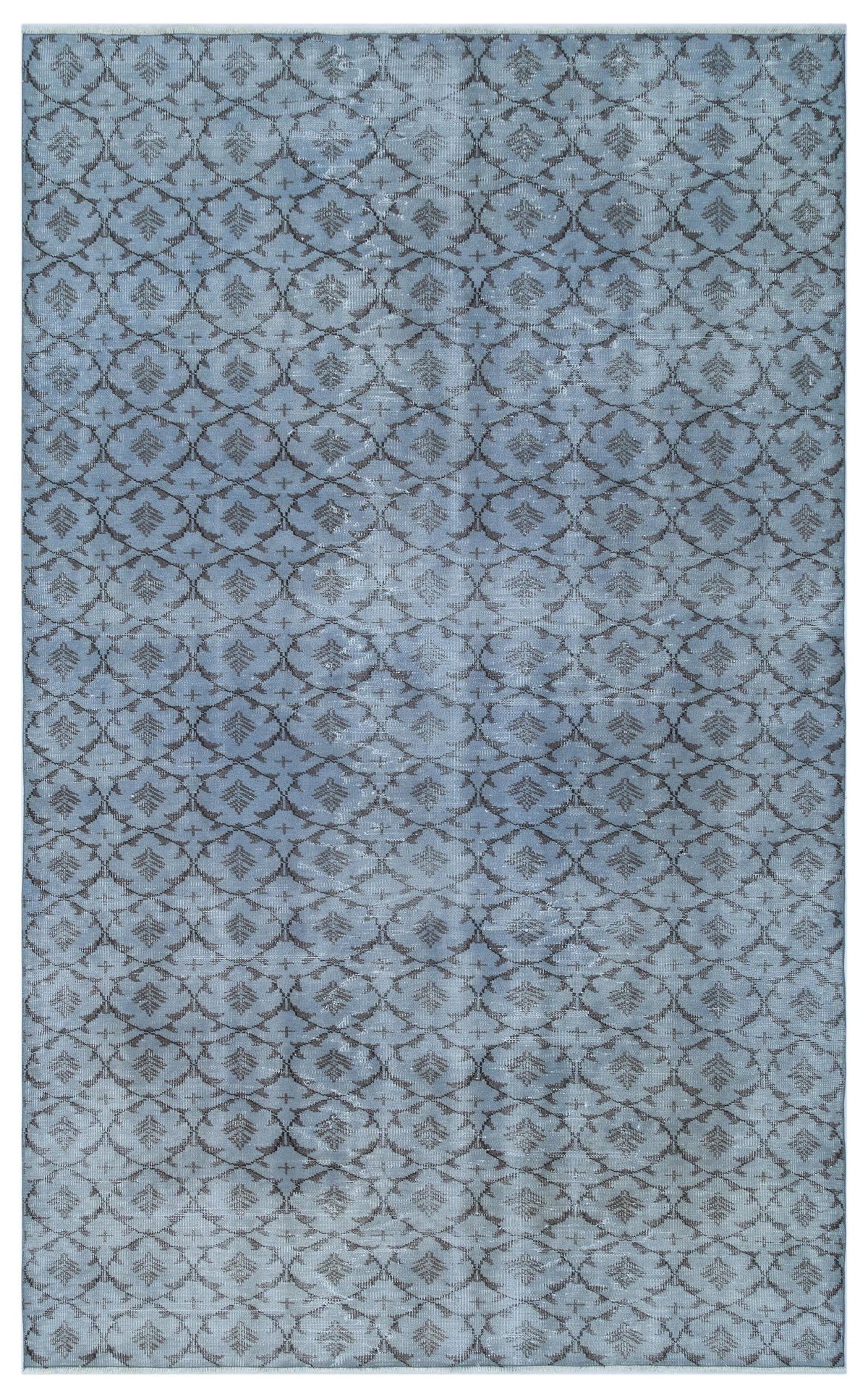 Slate blue rug with a dark grey repeating lattice pattern and distressed finish.