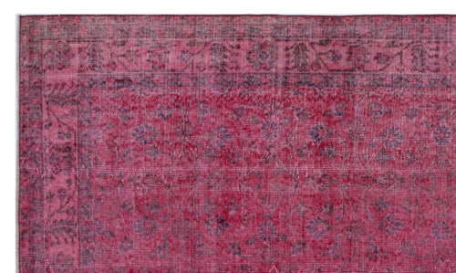 Load image 1 in gallery view. Deep red vintage-style rug with a dark floral border and a distressed, faded botanical pattern.