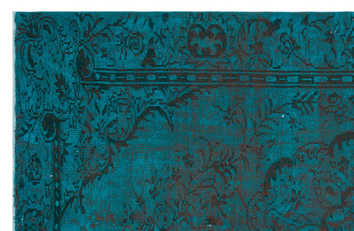 Load image 1 in gallery view. Teal and dark brown rug with a distressed traditional floral medallion pattern.