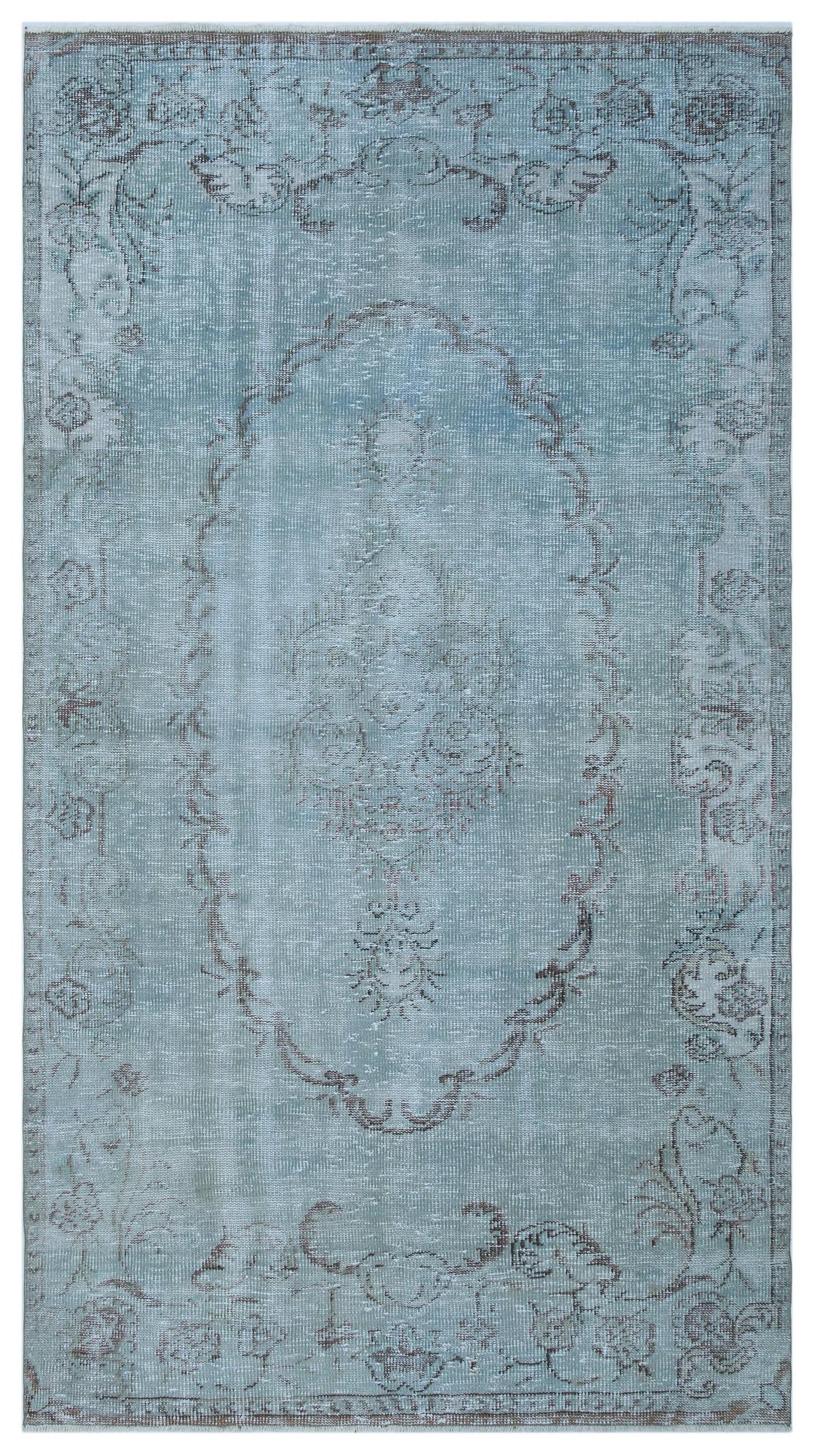 Distressed light blue rug with a central oval medallion and floral border in muted grey tones.