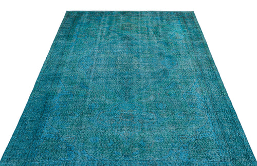 Load image 1 in gallery view. Teal and blue distressed traditional rug with a faded central medallion pattern on a white background.