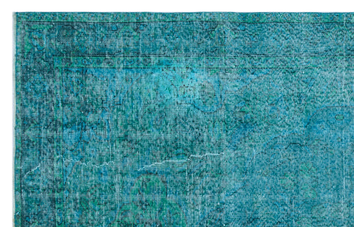 Load image 1 in gallery view. Teal and turquoise distressed rug with a faded traditional medallion pattern on a white background.