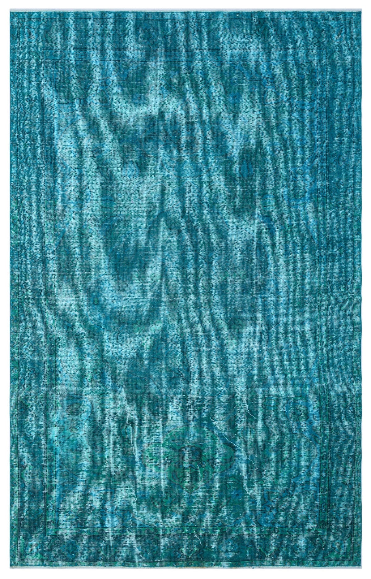 Teal and blue distressed traditional rug with a faded central medallion and ornate border.