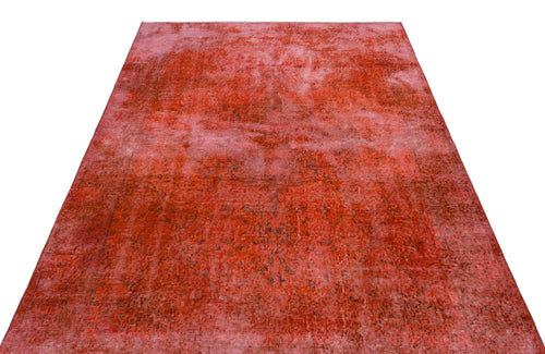 Load image 1 in gallery view. Red and pink distressed vintage-style rug with a faded traditional medallion pattern on a white background.