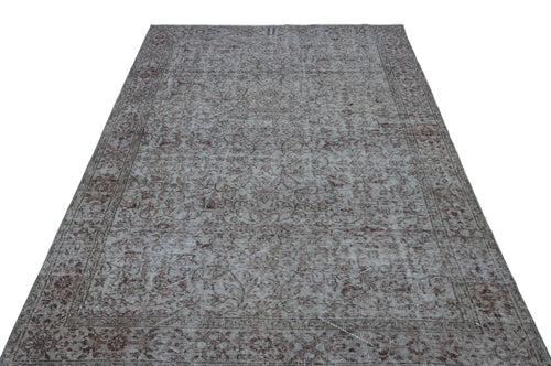 Load image 1 in gallery view. Grey and brown distressed vintage-style rug with an intricate floral pattern and a bordered frame.