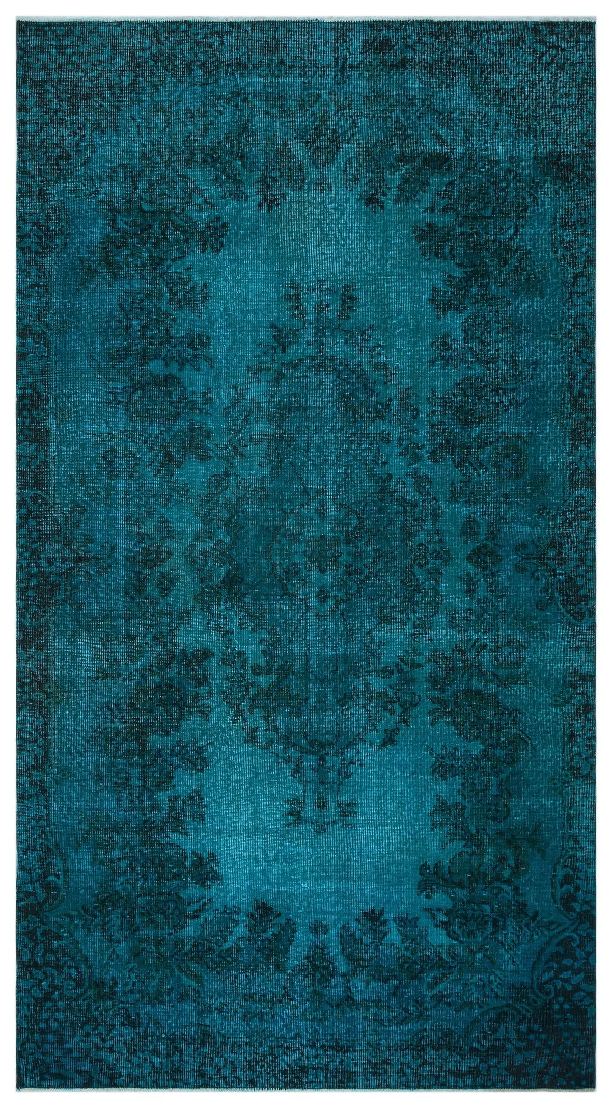Teal and black distressed rug with a traditional central medallion and floral border pattern.