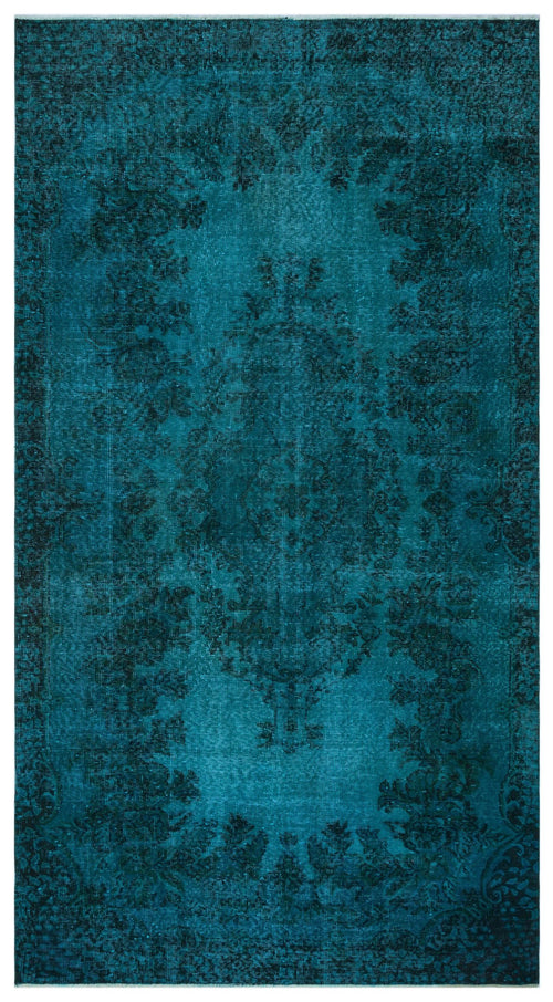Load image 1 in gallery view. Teal and black distressed rug with a traditional central medallion and floral border pattern.