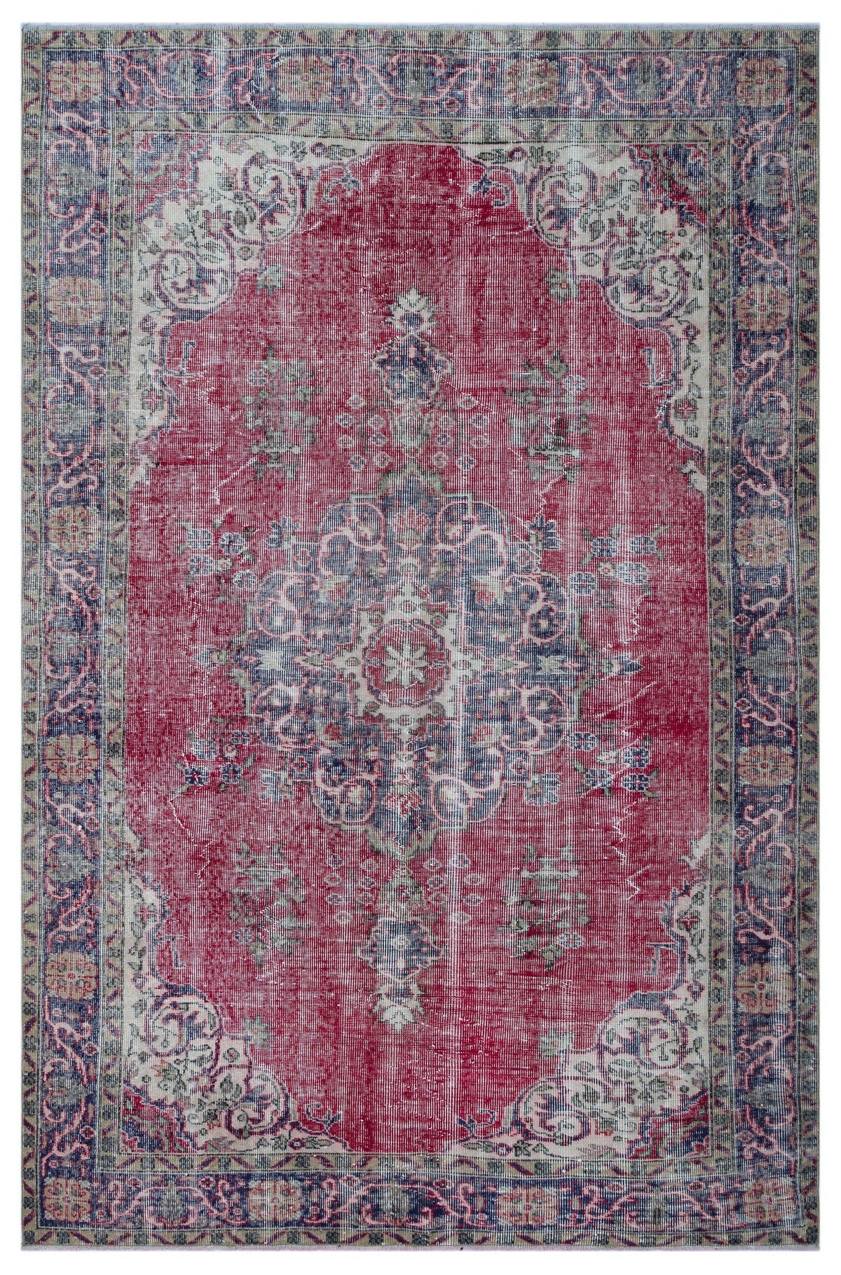 Distressed red, blue, and cream traditional rug with a central floral medallion and ornate border.