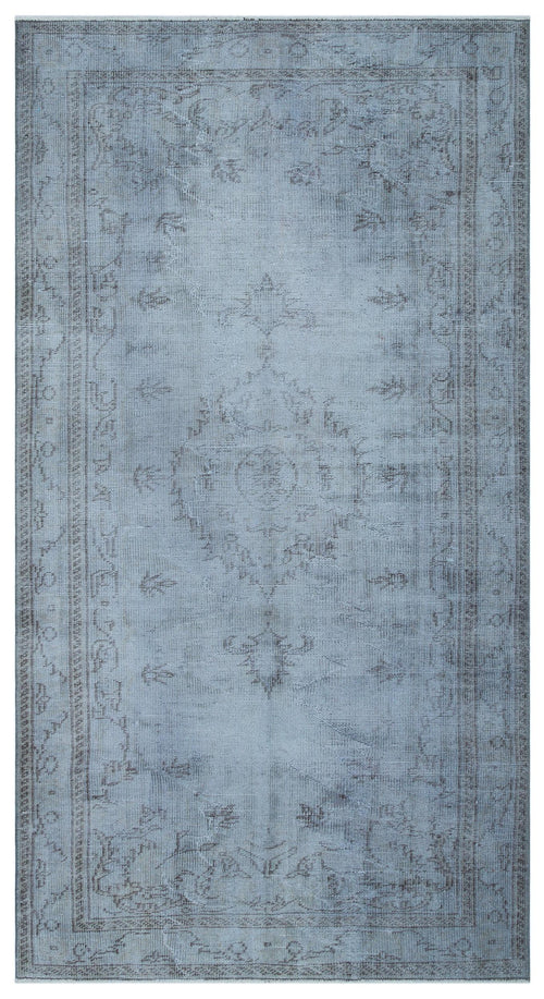 Load image 1 in gallery view. Light blue and grey distressed traditional rug with a central medallion and ornate border pattern.