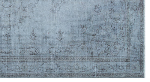 Load image 1 in gallery view. Light blue rug with a distressed, faded traditional medallion pattern and a bordered edge.