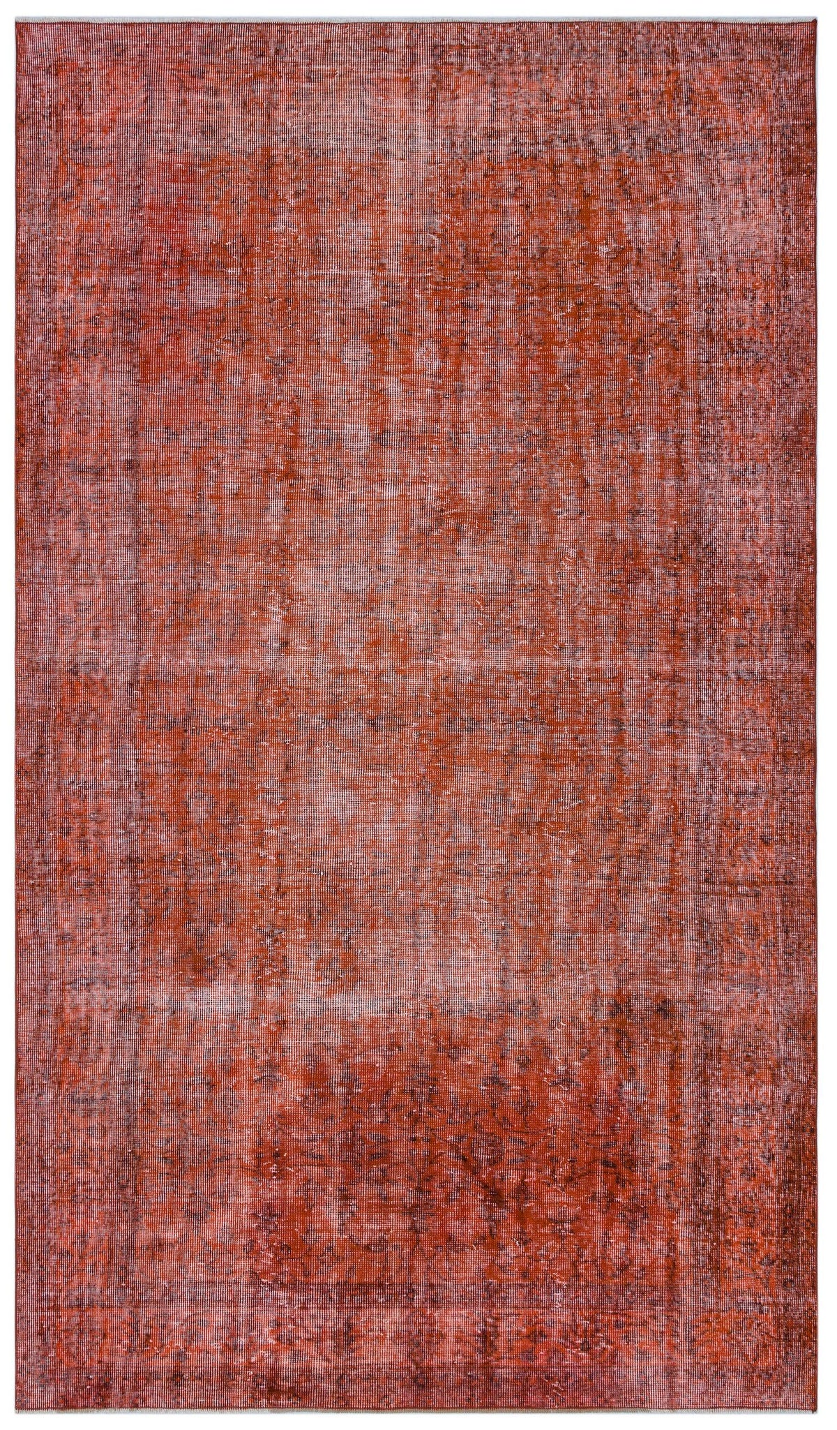 Rust-colored vintage-style rug with a distressed, faded texture and subtle rectangular border pattern.