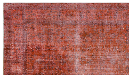 Load image 1 in gallery view. Rust-colored vintage-style rug with a distressed, faded texture and subtle dark tonal variations.