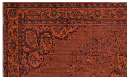 Load image 1 in gallery view. Rust-colored rug with a dark brown traditional floral border and intricate botanical motifs.