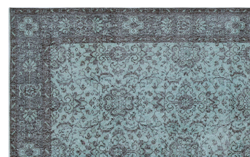 Load image 1 in gallery view. Dark charcoal and light blue rug with a traditional floral medallion pattern and a wide decorative border.