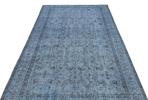 Load image 1 in gallery view. Blue and charcoal grey traditional rug with a distressed floral medallion pattern and a detailed border.