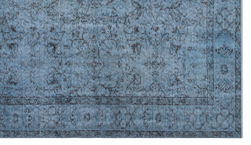 Load image 1 in gallery view. Distressed slate blue rug with a dark grey traditional floral medallion pattern and a detailed border.