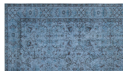 Load image 1 in gallery view. Blue and charcoal traditional rug with a distressed floral medallion pattern and a detailed border.