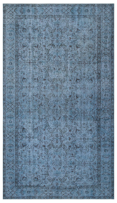 Load image 1 in gallery view. Blue distressed area rug with a dark grey traditional floral medallion pattern and a detailed border.