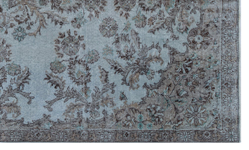 Load image 1 in gallery view. Light blue and brown distressed rug with a traditional floral medallion pattern and a detailed border.