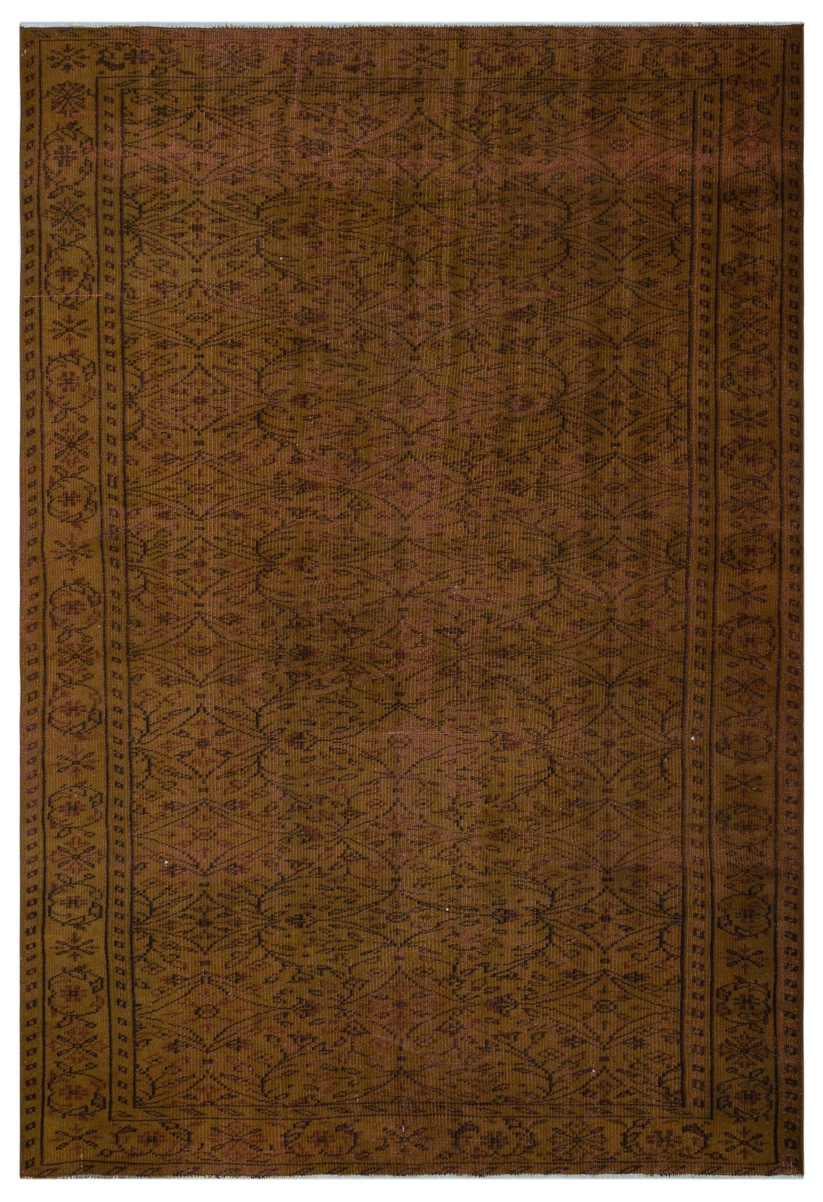 Dark brown traditional rug with a repeating geometric lattice pattern and a decorative floral border.