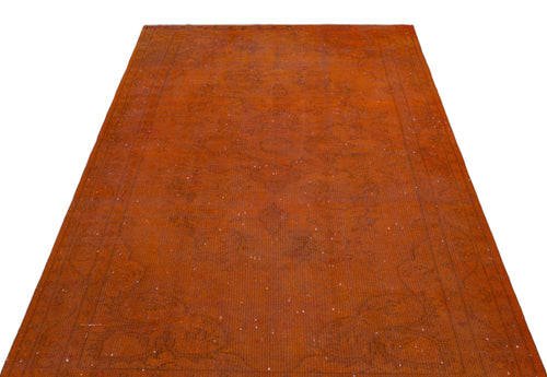 Load image 1 in gallery view. Rust-colored vintage-style rug with a faint, distressed traditional medallion pattern and a bordered edge.