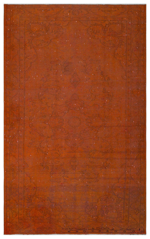 Load image 1 in gallery view. Rust-colored distressed rug with a faint, tonal traditional medallion pattern and a thin border.