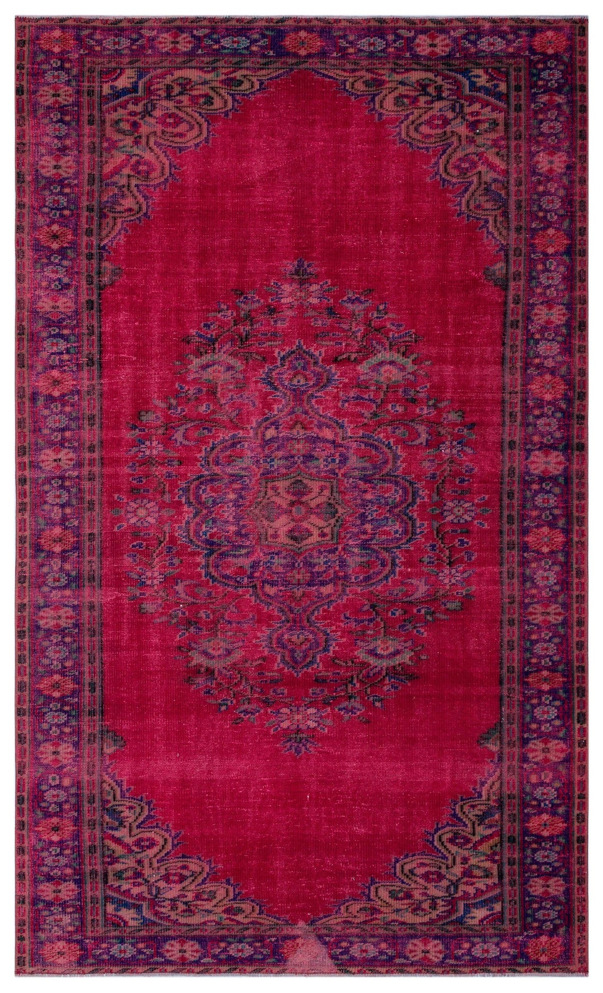 Magenta traditional rug with a central floral medallion and ornate border in navy and muted green tones.