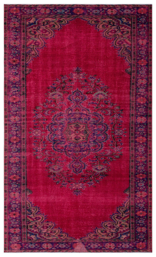 Load image 1 in gallery view. Magenta traditional rug with a central floral medallion and ornate border in navy and muted green tones.