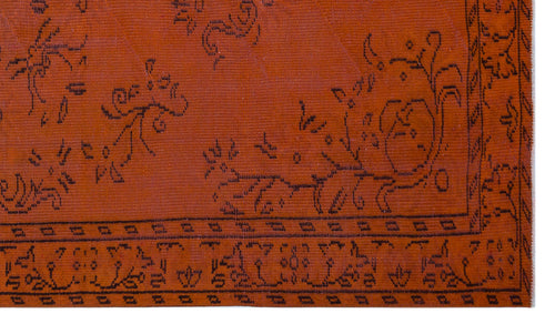 Load image 1 in gallery view. Rust-colored flatweave rug with a black linear floral pattern and a geometric border.