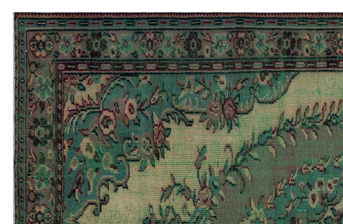 Load image 1 in gallery view. Teal and beige traditional rug with a distressed floral medallion pattern and a detailed decorative border.