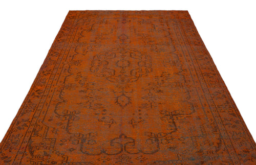 Load image 1 in gallery view. Burnt orange vintage-style rug with a dark charcoal traditional medallion and border pattern on a white background.