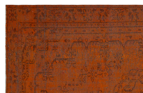 Load image 1 in gallery view. Burnt orange rug with a dark, distressed traditional floral medallion pattern and a bordered edge.