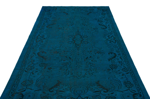 Load image 1 in gallery view. Teal rug with a black traditional floral medallion pattern on a white background.