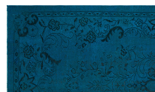 Load image 1 in gallery view. Teal rug with a black floral medallion pattern and a geometric border.