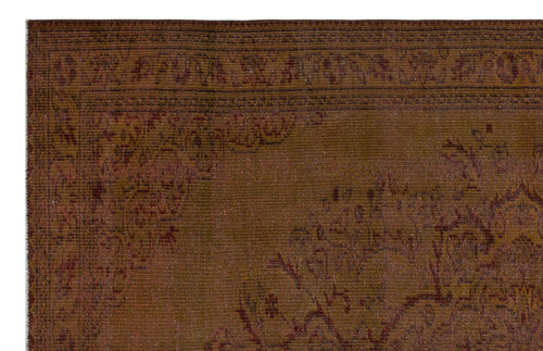 Load image 1 in gallery view. Dark brown traditional rug with a subtle, tonal floral medallion pattern and a detailed border.