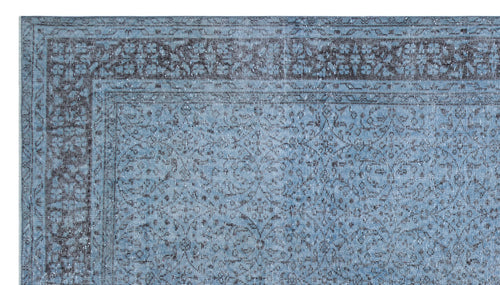 Load image 1 in gallery view. Blue and charcoal grey rug with a distressed traditional floral medallion pattern and a detailed border.
