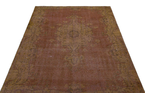 Load image 1 in gallery view. Distressed terracotta and mustard yellow rug with a traditional central medallion and ornate border.