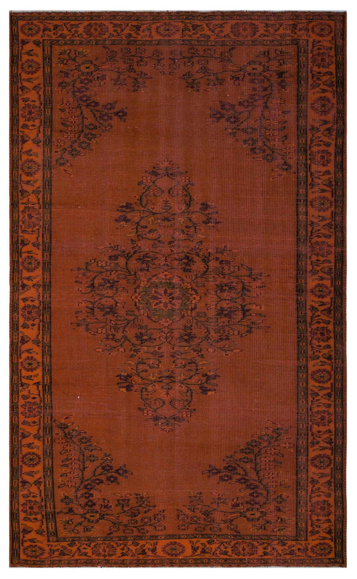 Rust-colored traditional rug with a central dark floral medallion and a decorative geometric border.
