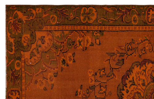 Load image 1 in gallery view. Rust orange and olive green rug with a traditional floral border and intricate botanical motifs.