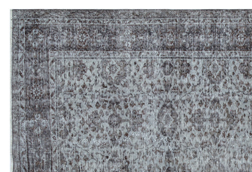 Load image 1 in gallery view. Charcoal and light grey distressed rug with a traditional ornate medallion pattern and a detailed border.