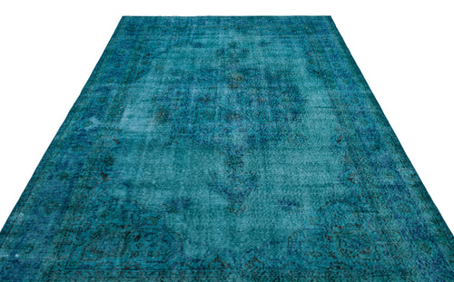 Load image 1 in gallery view. Teal distressed area rug with a traditional faded medallion pattern on a white background.