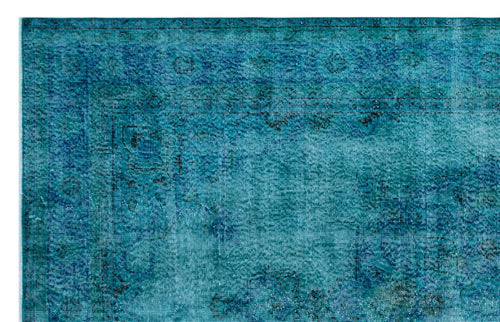 Load image 1 in gallery view. Teal and navy blue distressed rug with a traditional Persian-style border and faded floral medallion pattern.