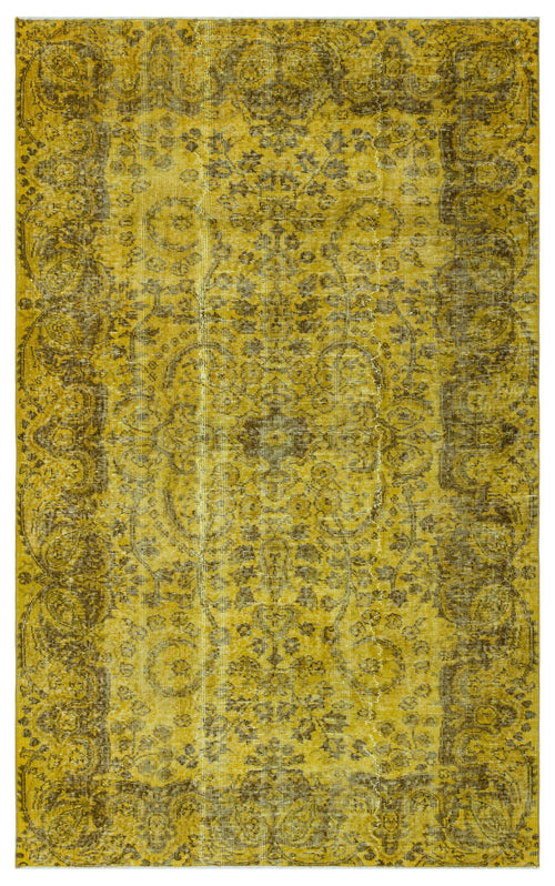 Load image 1 in gallery view. Mustard yellow and brown distressed vintage-style rug with a traditional floral medallion and border pattern.
