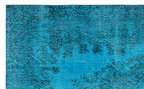 Load image 1 in gallery view. Bright turquoise rug with a distressed black floral and vine pattern.