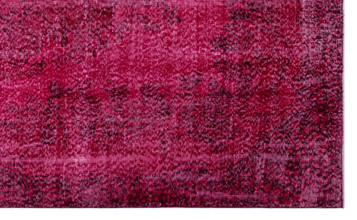 Load image 1 in gallery view. Magenta and black rug with a distressed, faded traditional floral pattern.