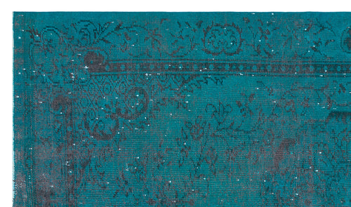 Load image 1 in gallery view. Teal and charcoal distressed rug with a traditional floral border and faded medallion pattern.