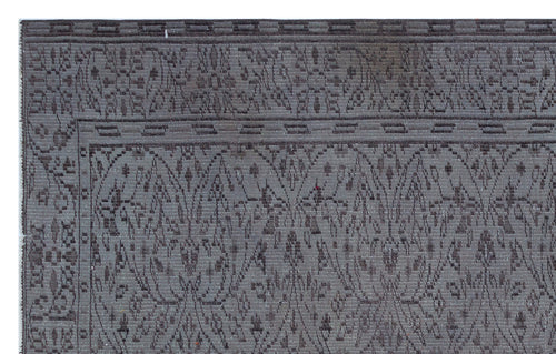 Load image 1 in gallery view. Charcoal and grey rug with a traditional floral medallion border and an intricate, repeating damask-style pattern.